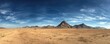© Syahrul - Vast panorama of a desert landscape under a vibrant, cloud-streaked blue sky, with distant mountains