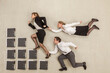 © VISTA by Westend61 - Businesswoman on staircase of files while others chasing