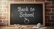 © MstRuzina - Back to school concept with chalkboard and colorful chalks on wooden table