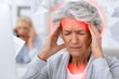 © whitestorm - Elderly woman experiencing severe headache with red glowing pain zones on her temples and neck.