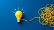 © Ahmed - Creative problem solving concept featuring a low poly yellow lightbulb connected to a tangled wire on blue background representing innovation