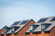 © Jevanto Protography - Photovoltaic solar panels on the roof of new built house in england uk. The concept of a sustainable environment, construction.