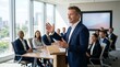 © imagemir - A confident middle-aged Caucasian man delivers a presentation to a diverse group of professionals in a bright office.
