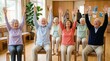© ZHMPRO - Group of diverse elderly people performing seated chair yoga exercises with arms raised during wellness session in community hall.