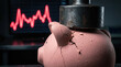 © Shan Junaid - Cracked Piggy Bank Under Heavy Pressure Symbolizing Financial Crisis and Inflation