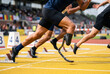 © Meow Creations - Sprinters starting race on track including athlete with prosthetic leg