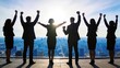 © Ethan - Silhouette of successful business team celebrating victory on rooftop, raising hands in triumph against city skyline background, achievement and leadership concept for corporate