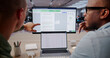 © Andrey Popov - Contract Manager Reviews Digital Agreements Using Software
