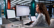 © Andrey Popov - Young Hispanic Woman Helping Team Solve IT Service Tickets Efficiently