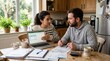 © Ирина Батюк - Couple managing household finances, discussing budget details, planning future expenses with laptop, reviewing financial documents, domestic economic strategy