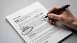 © Rozita - Hand holding pen reviewing and marking a document