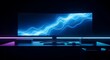 © MstUmme - A sleek modern computer scren displaying abstract blue light waves on a curved monitor for an immersive gaming setup in a dimly lit minimalist workspace