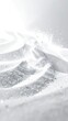 © Xaviera - Abstract close-up of white powder or sand particles being blown in the wind.
