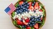 © adul - Fresh Berry and Feta Salad with American Flag Decoration.