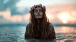 © svastix - A mystical woman adorned with a floral crown emerges from the ocean water during sunset, evoking feelings of beauty, freedom, and a deep connection with nature.