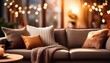 © Timothy - blurred living room with sofa pillows and warm lighting cozy home interior background