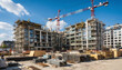 © Hanskie28 - Modern Residential Apartment Construction Site With Tower Cranes And Urban Development