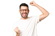 © luismolinero - Young handsome caucasian man over isolated chroma key background celebrating a victory