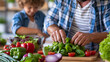 © Nataliya - Close-up of a father and son preparing a healthy salad lunch at home in a kitchen, healthy family meal concept, kitchen salad photography, nutritious family lifestyle, defocused
