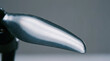 © newlifestock - Sleek aerodynamic design of metallic propeller blade with smooth surface reflecting light in minimalistic setting