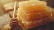 © GoDress - Honeycomb stack on wooden table, close-up, natural light