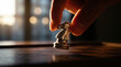 © Tonton1541 - Stock market visual metaphor silver chess knight focus
