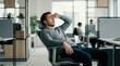 © DIAN - Tired Office Worker Overwhelmed In The Workplace, Frustrated And Burned Out