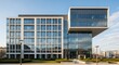 © fat - Modern architectural office building with glass facade and unique design.
