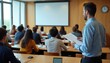© Viktor - Students attend seminar in classroom. Male teacher gives lecture to audience sitting at desks. People listen attentively near projection screen. Future professionals learn.