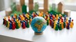 © Pro Team - A small globe surrounded by many colorful wooden game pawns representing the global population and community