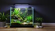 © mihrzn - A beautifully arranged nano aquarium with lush green plants and small fish, placed on a wooden floor in a modern living space.