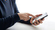 © ND CREATORS - person holding smartphone and touching screen with index finger