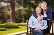 © BillionPhotos.com - Portrait of happy senior couple in park
