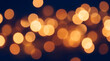 © Rendara Studio - Defocused warm golden bokeh lights on deep blue holiday background for festive overlay