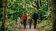 © NE97 - Happy family holding hands walking along a path in a lush green forest, celebrating Father's Day outdoors with a nature hike, healthy lifestyle and bonding.
