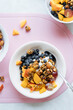 © Pietro Karras/Stocksy - Bowl with fresh healthy muesli