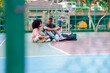 © Jovo Jovanovic/Stocksy - Basketball court conversation, father and daughter bonding time.