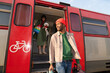 © Hernandez & Sorokina/Stocksy - Two People and a Dog Arrive at a Train Station