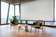 © Jovo Jovanovic/Stocksy - Modern office space with market analysis presentation and city view.