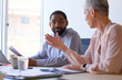 © Dimitrije Tanaskovic/Stocksy - Colleagues are sitting next to each other on a meeting