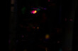 © Bye Bye Design - Colorful Abstract Bokeh Lights on Dark Background for Festive and Party Concepts