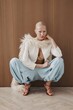 © Serge Filimonov/Stocksy - Stylish fashion portrait of woman in studio