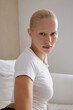 © Serge Filimonov/Stocksy - Portrait woman in white t-shirt