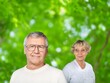 © BillionPhotos.com - Senior man and woman smiling in a green park during retirement outdoors