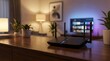 © Pixim Stock - Modern wireless router placed on wooden surface in cozy home living room setting illuminated by soft interior lights and blurred television screen in background image.