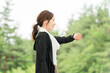 © buritora - A woman using a smartwatch while exercising (healthcare, music, workout).
