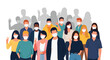 © Femke - Large and diverse crowd of people wearing protective face masks stands together in solidarity during a public health crisis or pandemic.
