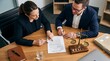 © Angel - Business meeting with lawyers reviewing legal documents
