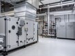 © Cantarela - Industrial HVAC system in modern data center cooling unit. Large ventilation equipment with metal pipes and control panel. Infrastructure for server room temperature control and climate.