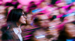© Parisa - Focused Businesswoman Looking Ahead Through Magenta Abstract Corporate Blur